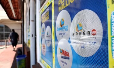 A California Lottery poster advertises Powerball and other lotteries at a convenience store on July 18