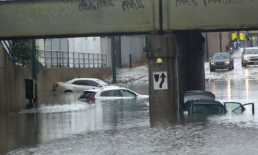 Cars are caught in flash flood in Chicago on Saturday