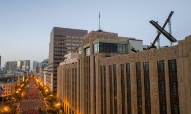 An aerial view shows a newly constructed X sign on the roof of the headquarters of the social media platform previously known as Twitter