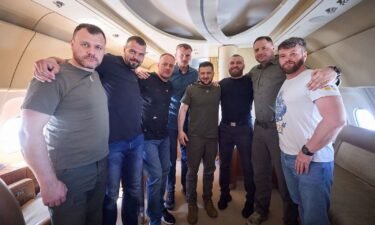 Zelensky pictured with Azovstal commanders as they return to Ukraine from Istanbul.