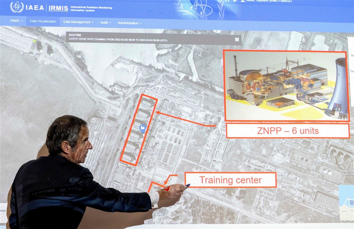 Rafael Grossi points on a map of the Zaporizhzhia nuclear power plant in March of 2022.