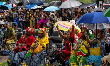 Spectators react after King Willem-Alexander apologized for the royal house's role in slavery at an event to commemorate the anniversary of the abolition of slavery by the Netherlands on July 1.