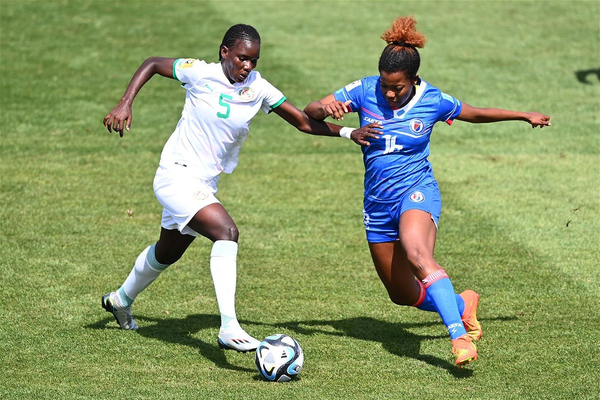 <i>Hannah Peters /FIFA/Getty Images</i><br/>Milan Pierre-Jerome of Haiti (right) fights for the ball against Senegal in a World Cup warm-up match on February 18 in Auckland