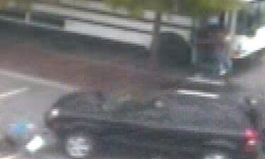 Police released surveillance images of a black SUV and asked for the public’s assistance in identifying the vehicle and its driver.