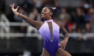 Simone Biles competes in the balance beam at the US Gymnastics championships.