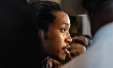 Democratic Tennessee State Rep. Justin Jones speaks to reporters outside the House chamber on Monday after he was silenced by a procedural move during a special session in Nashville.