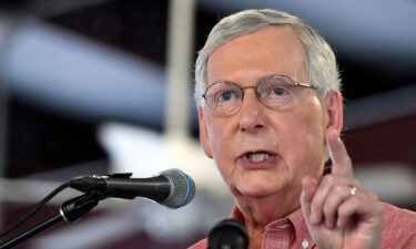 Senator Minority Leader Mitch McConnell entered the Graves County Republican Party Breakfast to a standing ovation and applause