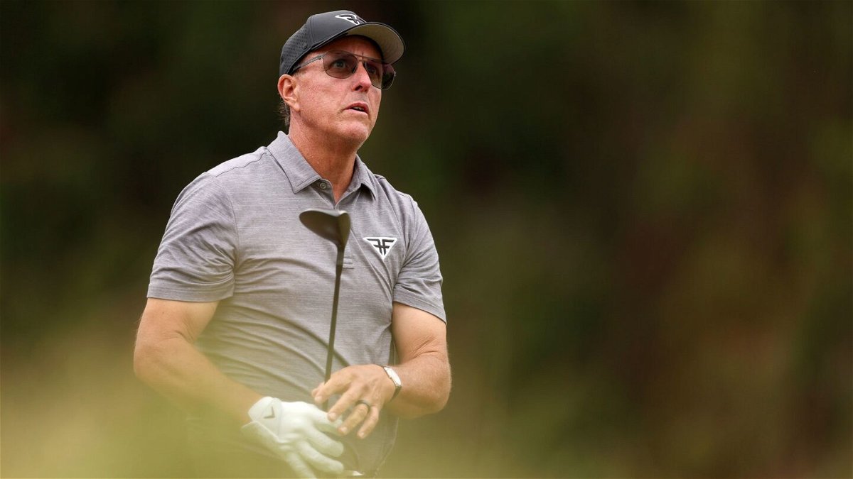<i>Sean M. Haffey/Getty Images</i><br/>Phil Mickelson watches his tee shot from the seventh tee during the second round of the 123rd U.S. Open Championship at The Los Angeles Country Club on June 16.