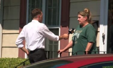 Amy Trujillo speaks to a reporter after Virginia State Police say her husband