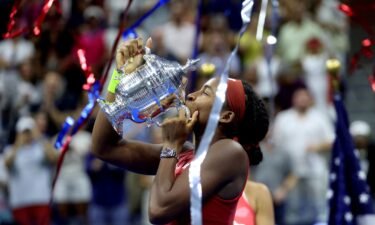 Coco Gauff kisses her trophy after winning the US Open women's singles final at Arthur Ashe Stadium in New York on Saturday