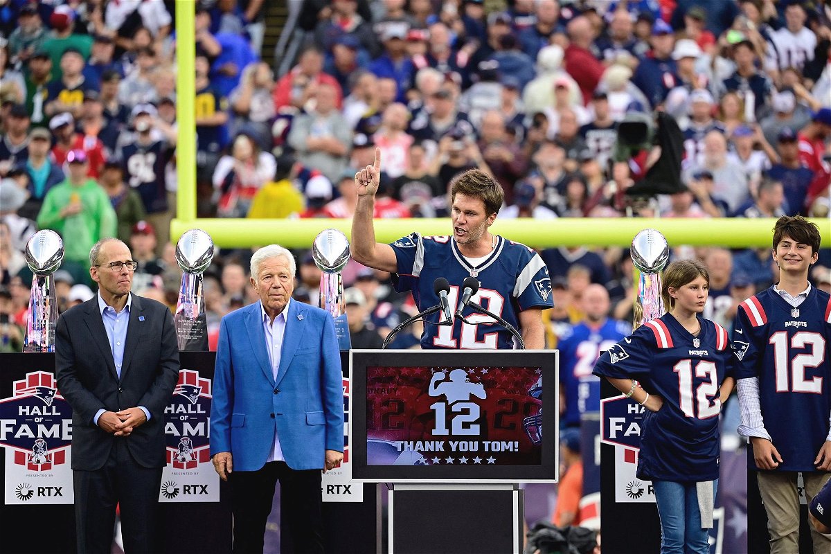 <i>Michael Dwyer/AP</i><br/>Brady reaches out to fans following the ceremony in his honor.
