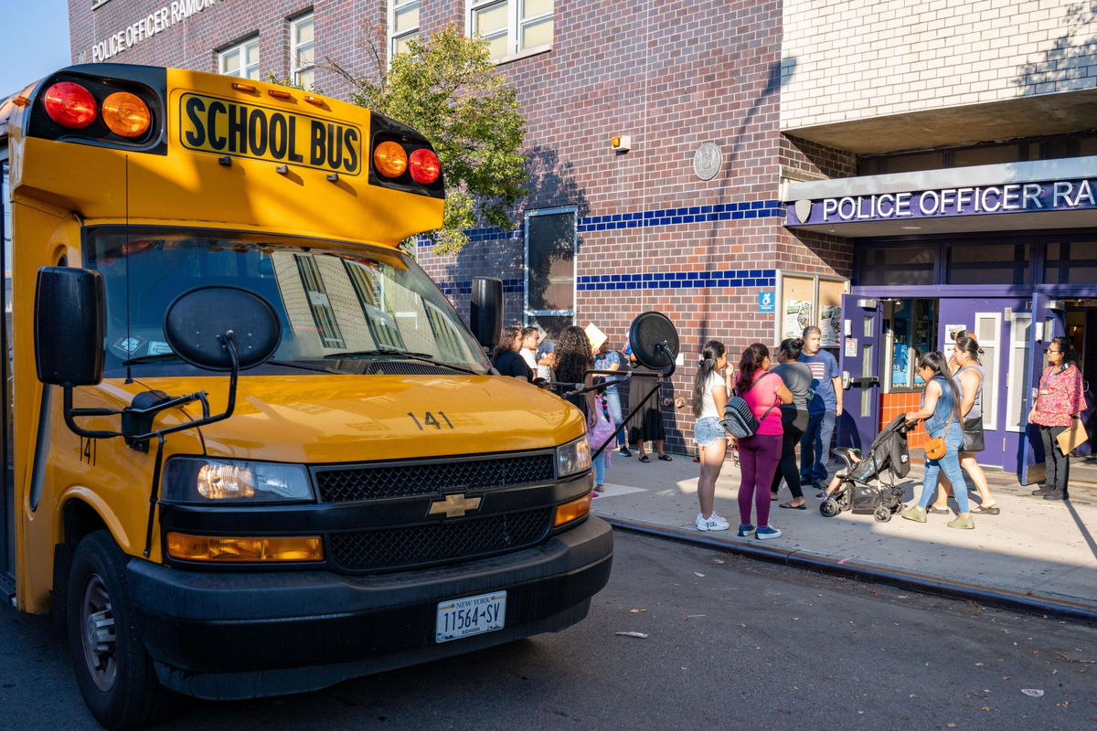 <i>Theodore Parisienne/NY Daily News/Getty Images</i><br/>Students headed back to school in Brooklyn on Thursday