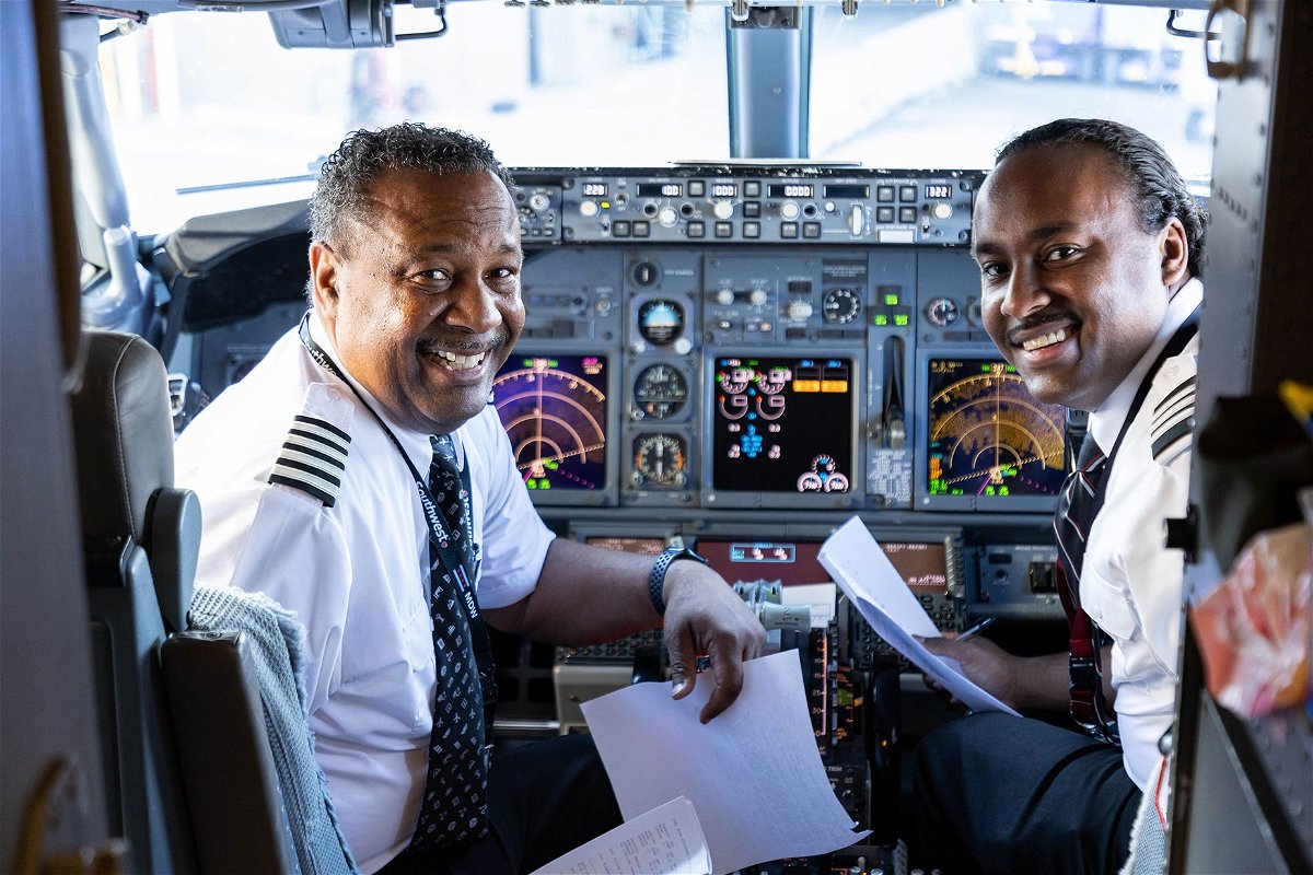 <i>Courtesy Southwest Airlines</i><br/>Here's Captain Ruben Flowers and First Officer Ruben Flowers recreating the 1990s photo in 2023.
