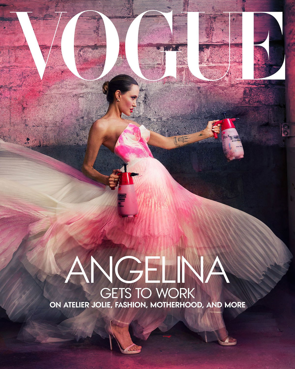 <i>Annie Leibovitz/Courtesy Vogue</i><br/>Jolie sprays a white gown pink in Atelier Jolie