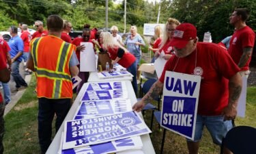 United Auto Workers members and supporters picket outside a General Motors facility in Langhorne