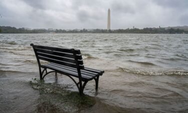 The Tidal Basin in Washington overflows the banks with the rain from Tropical Storm Ophelia on Saturday.