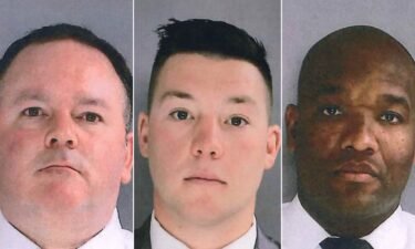 The three officers involved in the fatal shooting were fired and later sentenced to five years of probation after pleading guilty to charges of reckless endangerment.
