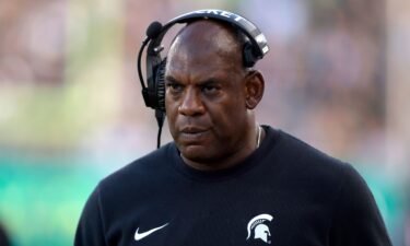 Michigan State coach Mel Tucker walks the sideline during an NCAA college football game against Richmond on September. 9.