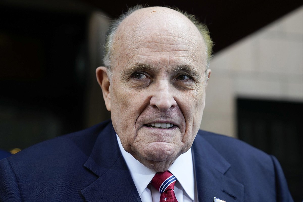 <i>Seth Wenig/AP</i><br/>Former Mayor of New York Rudy Giuliani speaks to reporters as he leaves his apartment building in New York