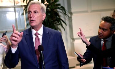 House Speaker Kevin McCarthy speaks to reporters as he leaves a House Republican caucus meeting at the US Capitol on September 14 in Washington