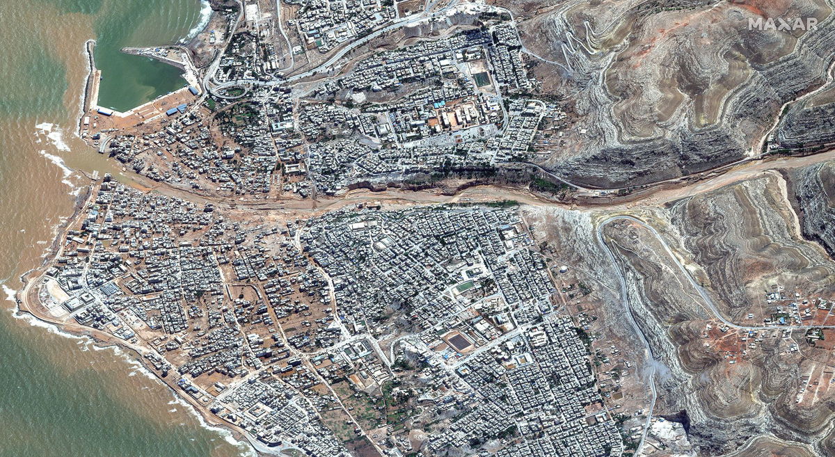 <i>Maxar Technologies/Reuters</i><br/>A satellite image shows the town of Derna in the aftermath of the floods in eastern Libya on September 13.