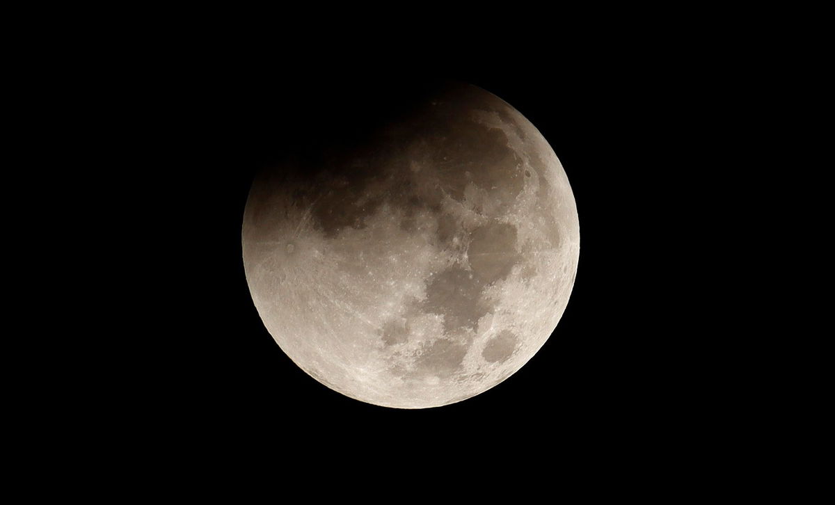 <i>Gary Hershorn/Corbis News/Getty Images</i><br/>The full beaver moon begins to pass through the Earth's shadow during a total lunar eclipse in November in New York. On Saturday