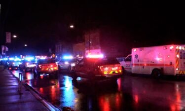 Emergency vehicles gathered at the scene of a shooting on Chicago's west side early Sunday.
