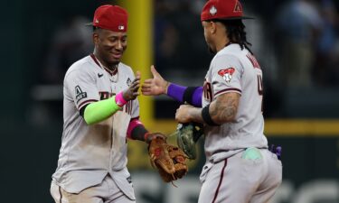 Arizona Diamondbacks' Ketel Marte hits a two-run single against the Texas Rangers during the eighth inning in Game 2.