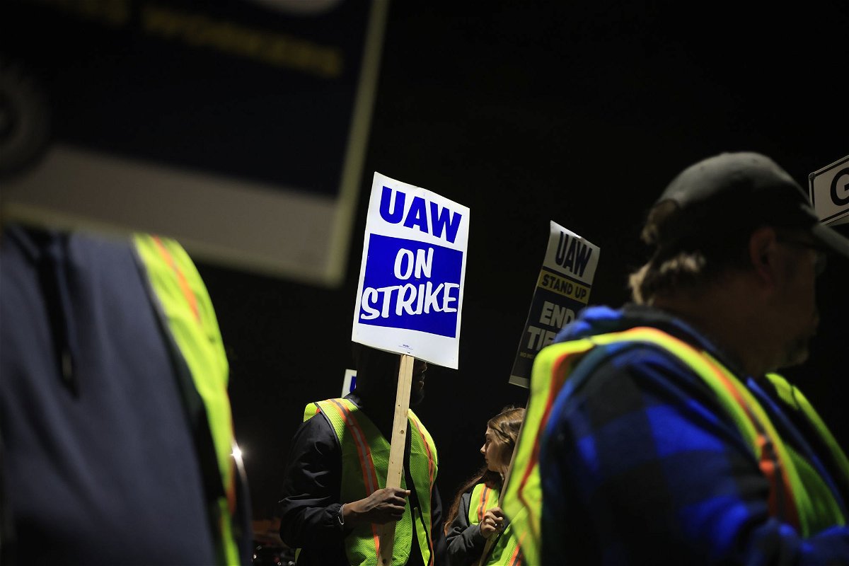 <i>Luke Sharrett/Getty Images</i><br/>Factory workers and UAW union members form a picket line outside the Ford Motor Co. Kentucky Truck Plant in the early morning hours on October 12
