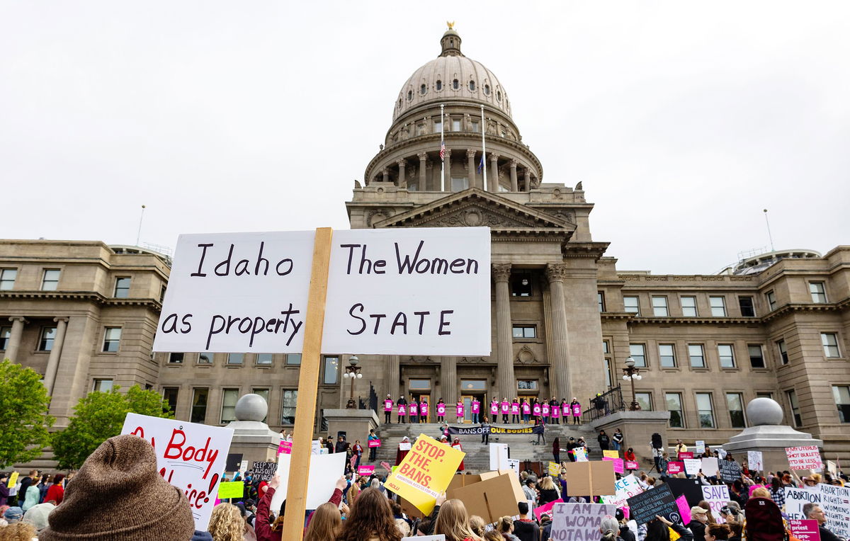 <i>Sarah A. Miller/AP/FILE</i><br/>An attendee at Planned Parenthood's Bans Off Our Bodies rally for abortion rights holds a sign reading 