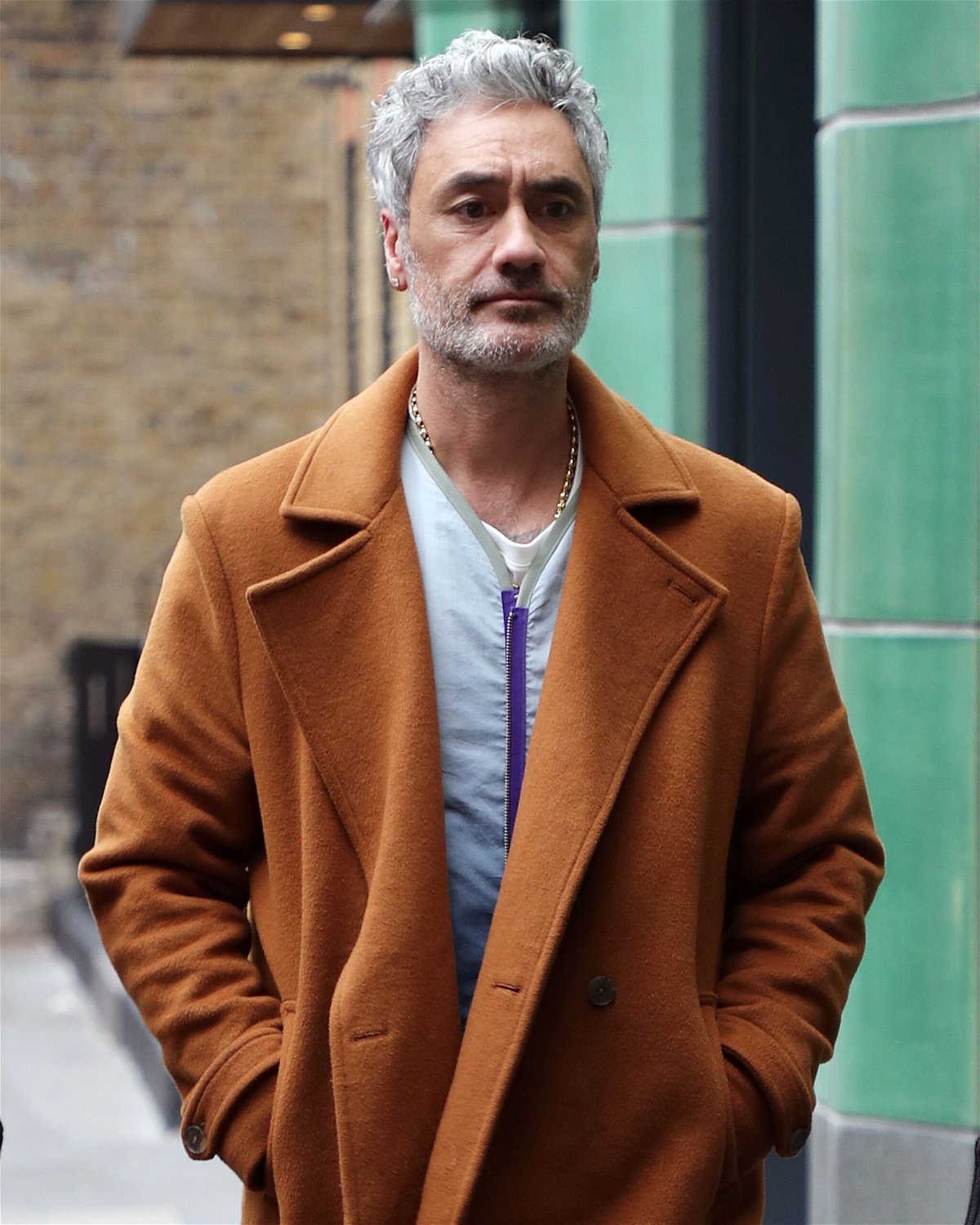 <i>Neil Mockford/GC Images/Getty Images</i><br/>Taika Waititi is pictured in London in November. Waititi doesn’t mind getting super candid about why he joined the Marvel Universe with 2017’s “Thor: Ragnarok.”