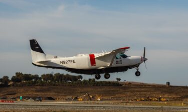 The crew preparing the Cessna Caravan for the unmanned flight.