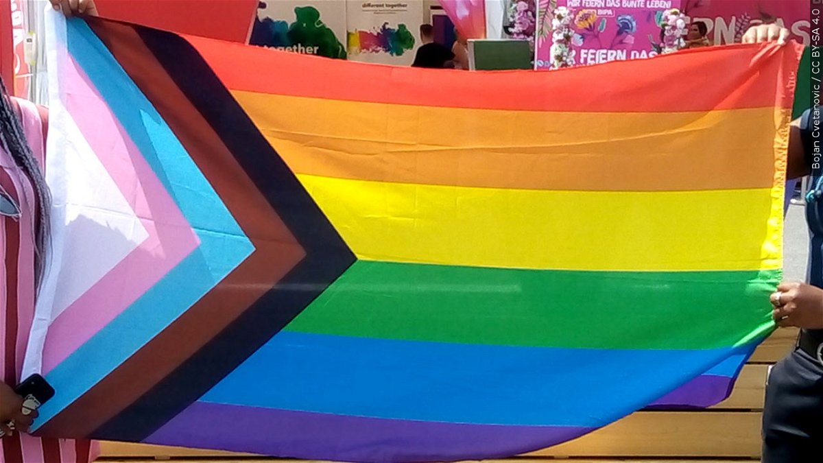 PHOTO: Progress Pride Flag (Rainbow, Black, Brown, and trans pride stripes flag, new symbol of the LGBTQ+ community), Photo Date: June 2019