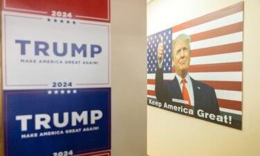 Former President Donald Trump's posters are displayed at his campaign headquarters in Urbandale