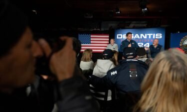 Florida Gov. Ron DeSantis speaks to supporters during an event at Wally's in Hampton
