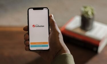TurboTax is displayed on a device in this file 2018 photo. The Federal Trade Commission ruled in a final order and opinion Monday that TurboTax engaged in deceptive advertising and banned the company from advertising its services for free unless it is free for all customers.