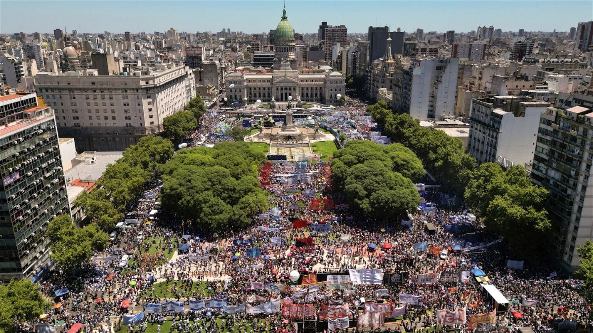 <i>Rodrigo Abd/AP</i><br/>People rally outside Congress during a national strike against the economic and labor reforms proposed by Argentine President Javier Milei in Buenos Aires