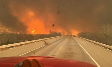 At least 1 dead as large wildfires sweep through the Texas panhandle.