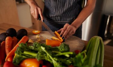 A separate cutting board for produce and cheese helps to avoid cross contamination in the kitchen.