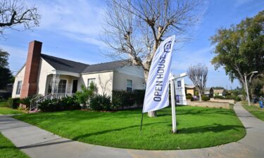 Prospective buyers attend an open house at a home for sale in Larchmont