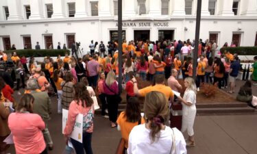 Protesters gathered outside the Alabama State House in Montgomery in the wake of the IVF ruling on February 28