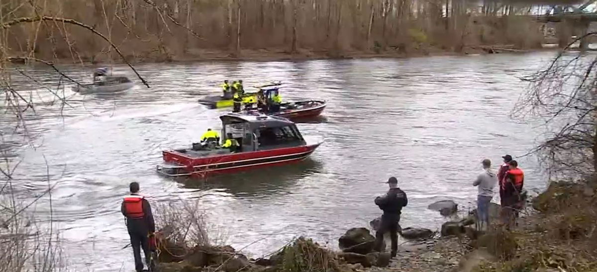 <i>KPTV via CNN Newsource</i><br/>Clackamas firefighters and the Oregon City Police Department worked together to pull the body of a driver out of a car that drove into the Clackamas River.