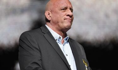 Mark Coleman stands on stage during the induction ceremony for the UFC Hall of Fame 2020 class.