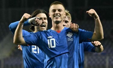 Albert Guðmundsson celebrates after scoring for Iceland.