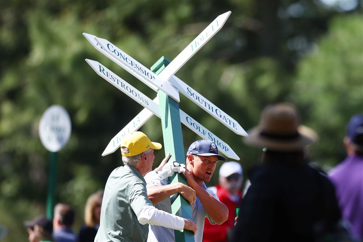 <i>Maddie Meyer / Getty Images via CNN Newsource</i><br/>DeChambeau played out of the woods to set up a birdie.