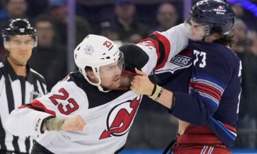 Kurtis MacDermid (left) and Matt Rempe fight during the NHL game between the New York Rangers and the New Jersey Devils.