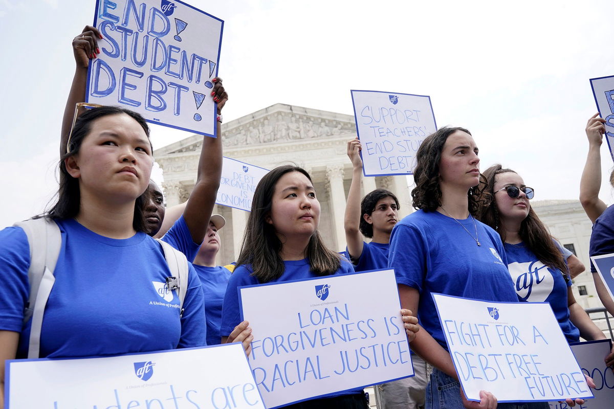 <i>Jacquelyn Martin/AP/File via CNN Newsource</i><br/>People demonstrate outside the Supreme Court on June 30