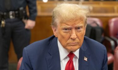 Former President Donald Trump sits in the courtroom at Manhattan criminal court in New York