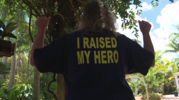of Loxahatchee wears her "Proud U.S. Navy Mom" T-shirt with pride