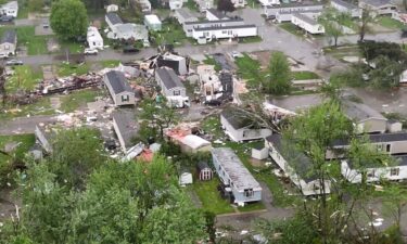 Debris is seen at a damaged FedEx facility after a tornado in Portage